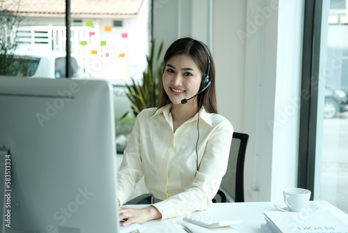 Confident asian businesswoman talking to the camera video calling video conference with his business partners in office.