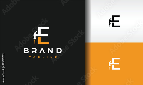 letter E hammer nail logo
