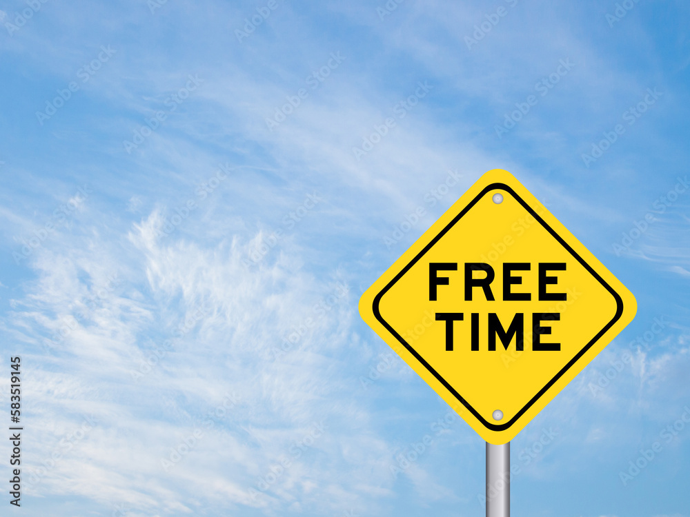 Yellow transportation sign with word free time on blue color sky background Yellow transportation sign with word free time on blue color sky background