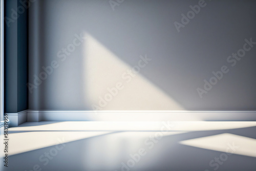 Light gray wall and smooth floor with interesting light reflections. Background for the presentation.