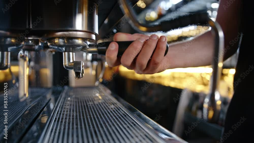 barista makes coffee in a coffee machine in a restaurant. slow motion. High quality 4k footage