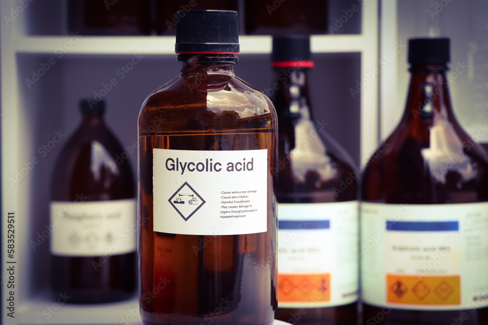 Glycolic acid in glass,Hazardous chemicals and symbols on containers Glycolic acid in glass,Hazardous chemicals and symbols on containers