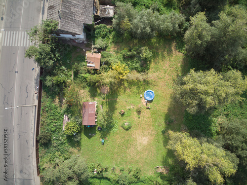 The top view of Jatujak park in Bangkok city. In the morning people are love coming to exercise here. The garden is designed in to the geometry of circular and triangle look like peaceful sign. photo