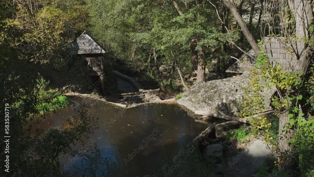 Traditional water mill for grinding in Romania, autumn, 4k Traditional water mill for grinding in Romania, autumn, 4k