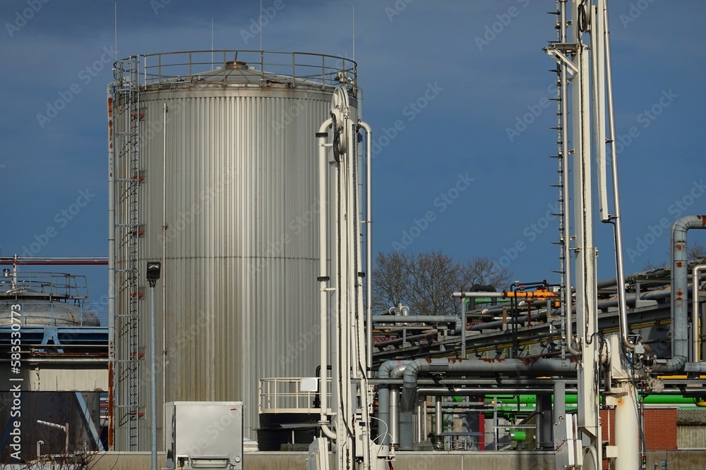 factory with tubes, warehouses, production buildings