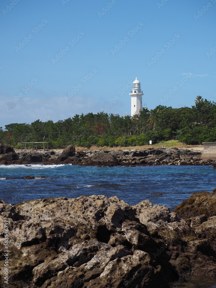 Scenery of the beach with lighthouse