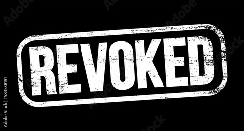 REVOKED text stamp, business concept background