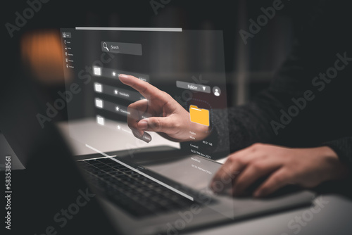 Document management system concept, business man holding folder and document icon software, searching and managing files online document database, for efficient archiving and company data.