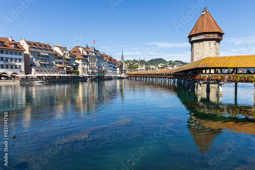 city view with historic chapel bridge Kapellbrücke and water tower of lucerne in switzerland