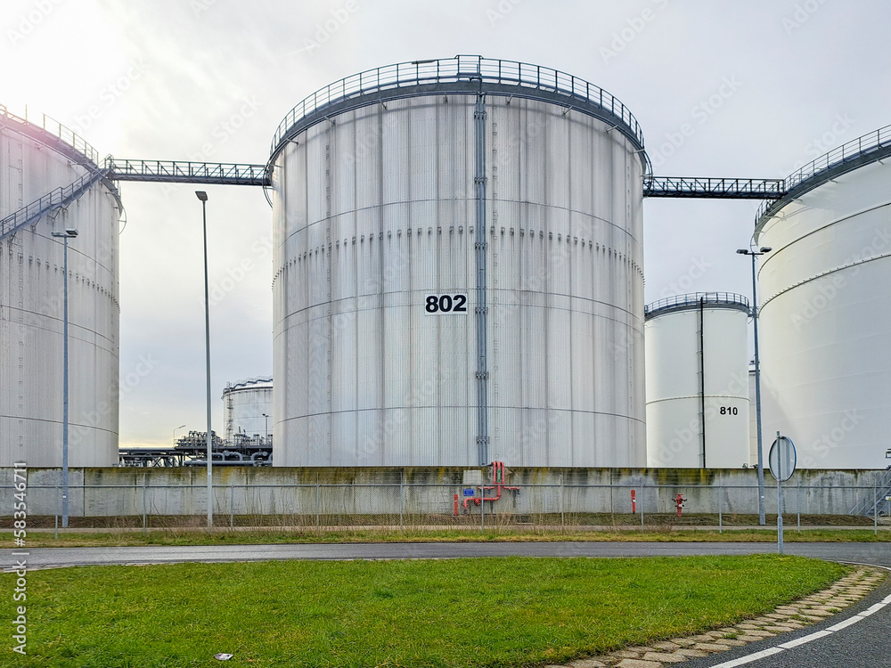 Tanks for oil and petro storage at the Pernis harbor in the port of Rotterdam