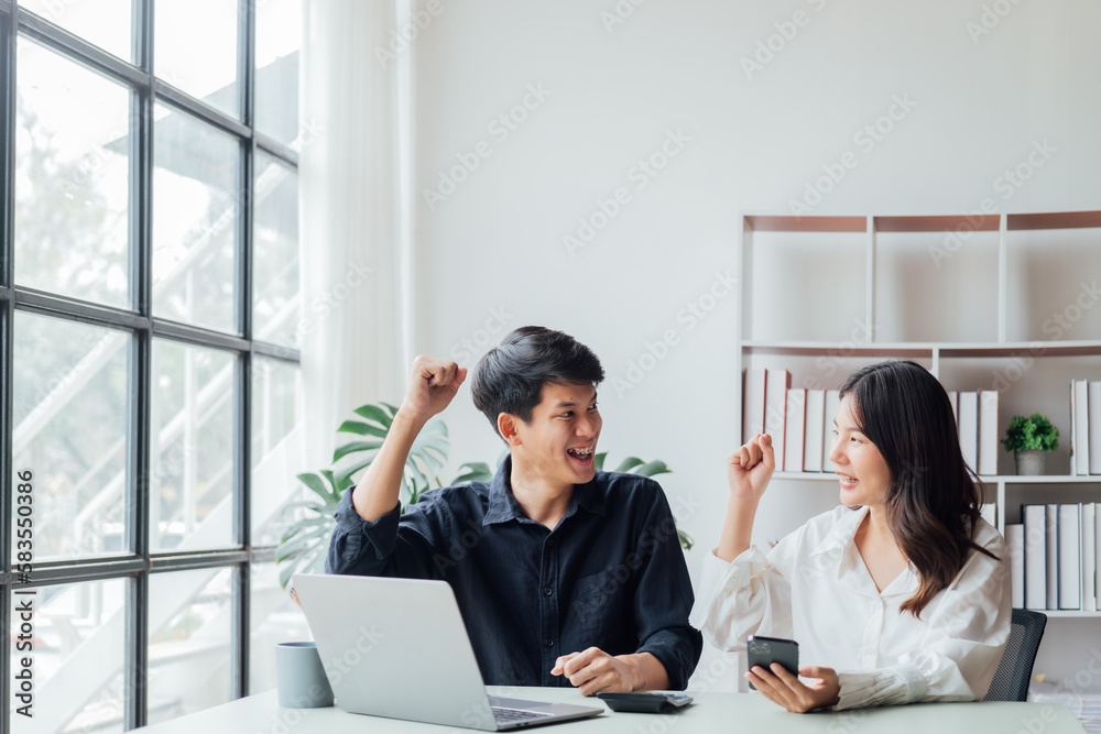 young husband and wife working at office by new project serious and happy young husband and wife working at office by new project serious and happy