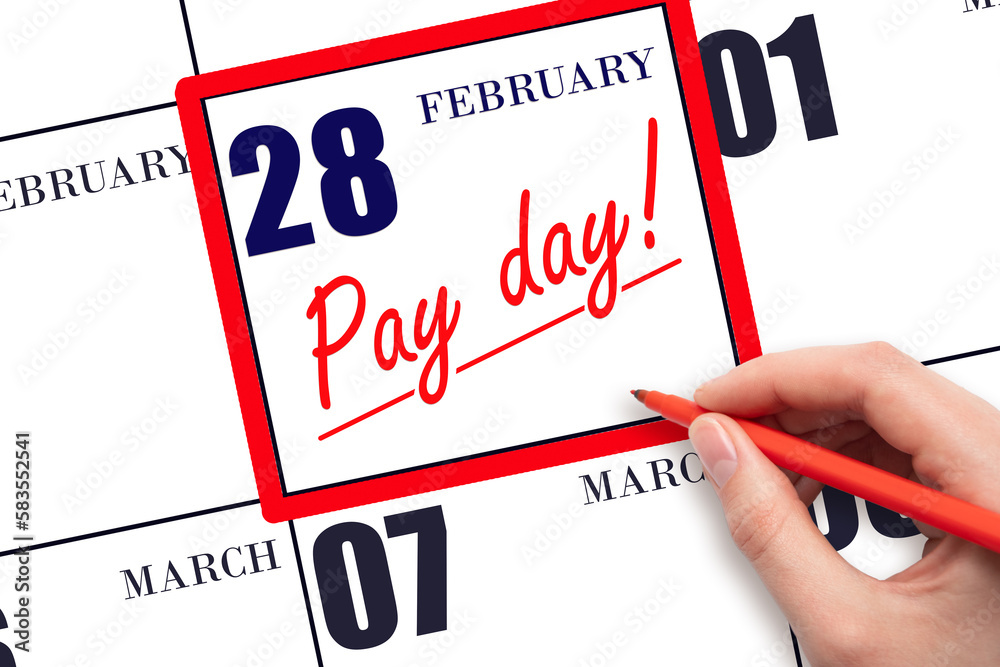 Hand writing text PAY DATE on calendar date February 28 and underline it. Payment due date Hand writing text PAY DATE on calendar date February 28 and underline it. Payment due date
