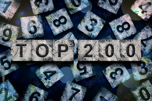 Top 200, words, above different numbers, on a dark blue background, with different letters. Alphabet on stone blocks.Rating. Rating concept.