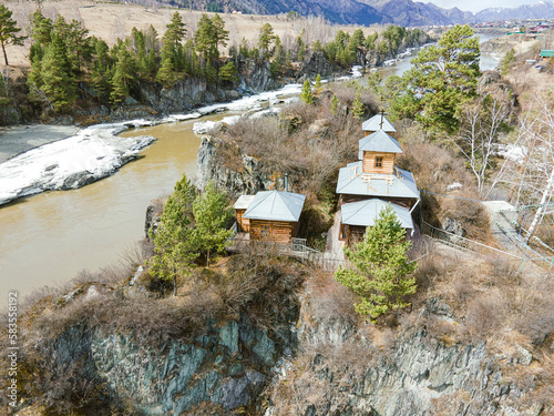 St. John the Theologian temple on the Patmos island on Katun river in Altai Mountains near Chemal village. Russian Siberia. aerial view