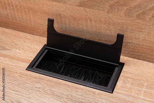 фотографія black flush mount brush grommet, wire management
