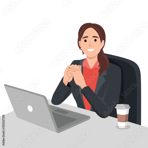 Pretty woman is sitting at desktop. Office employee at the workplace. Work at the laptop