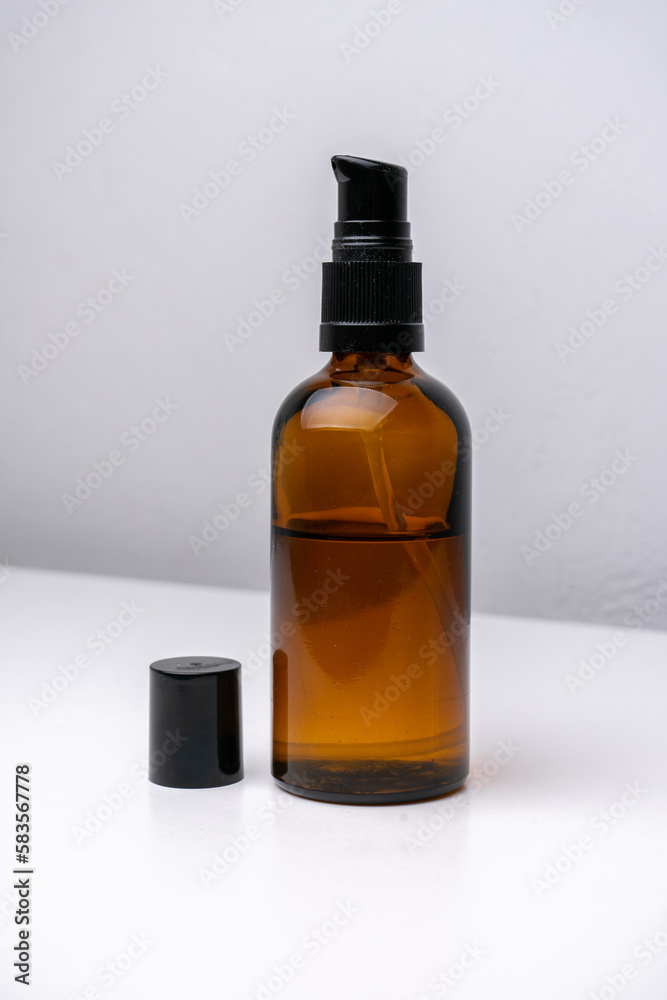 Brown glass cosmetic bottle isolated