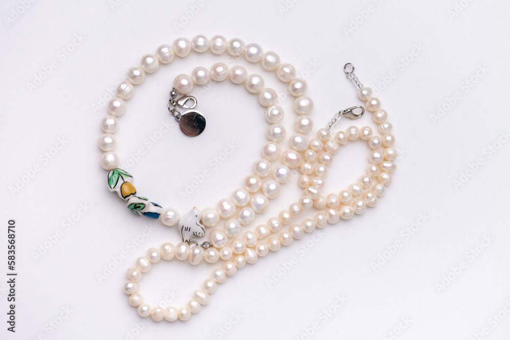 pearls stings on white background