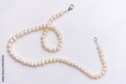 pearls stings on white background