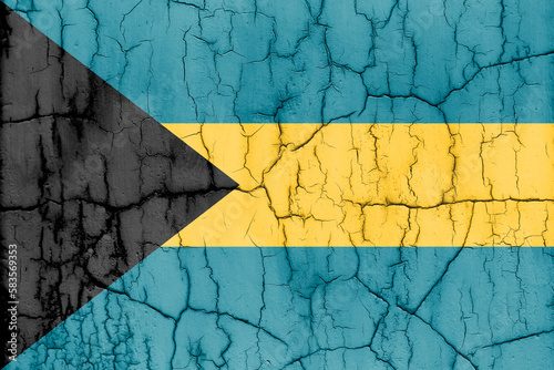 Flag of Bahamas on cracked wall, textured background.