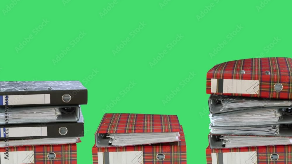 Stacks of folders with judge's gavels on green background Stacks of folders with judge's gavels on green background