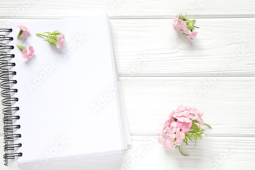 Blank notebook with pink flowers, mock up