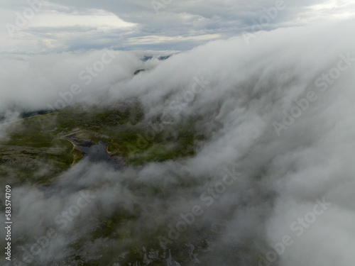 Aerial view of mountains with clouds