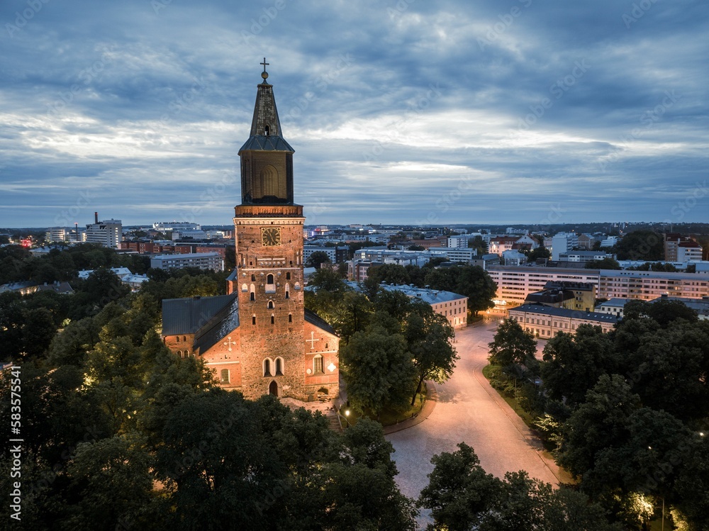 Aerial view of the Turku cathedral illuminated in late evening in Turku, Finland