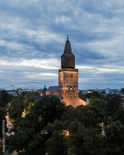 Vertical aerial view of the Turku cathedral illuminated at late evening in Turku, Finland