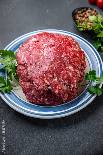 raw beef minced meat ground meat fresh ready to cook meal food snack on the table copy space food background rustic top view
