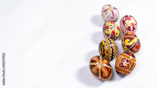 Beautiful painted tradition Ukrainian Easter Eggs (Pysanky) on a white background. Greeting card.