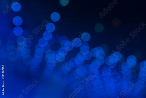 Abstract circular bokeh background  defocused bokeh lights on blue background
