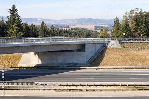 Tableau sur toile RABKA ZDROJ, POLAND - MARCH 19, 2023: The Zakopianka road near Rabka Zdroj city, Poland