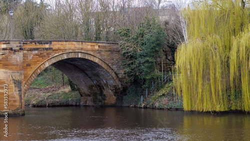 bridge over the river at yarm with trees. photo