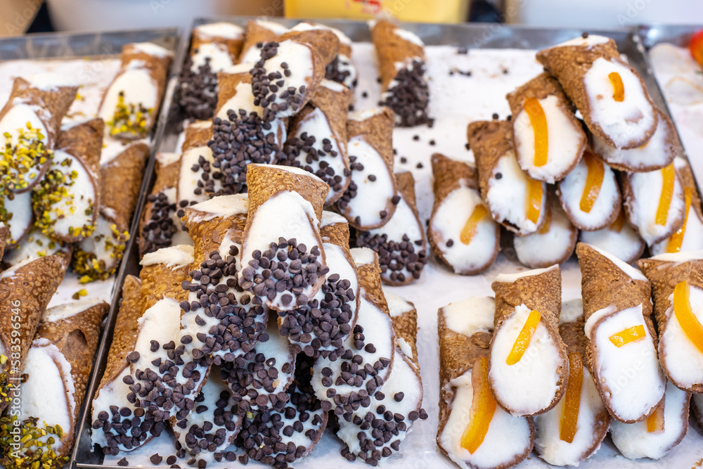 Sicilian cannolo is a typical dessert from Sicily. Sweet cream tubes. Bakery products. Organic food