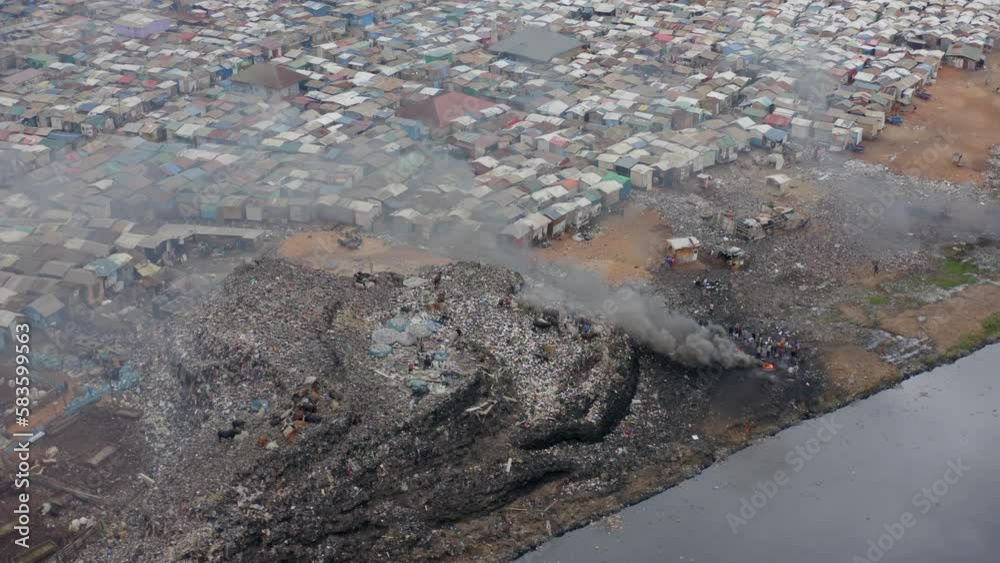 Burning of waste at waste dump near slum area in Africa 2 Burning of waste at waste dump near slum area in Africa 2