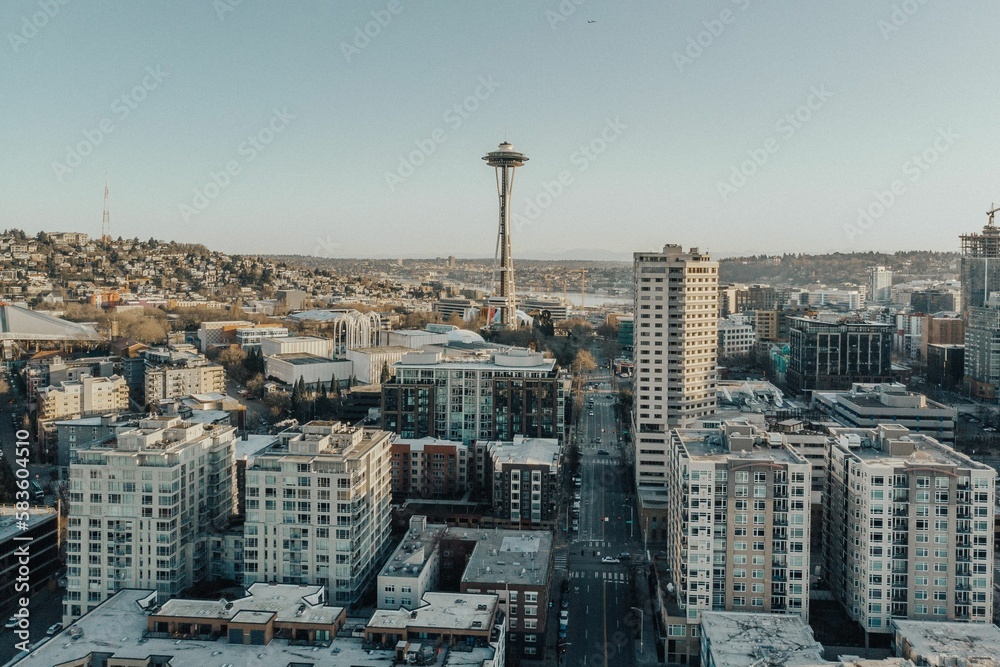 Fototapeta premium Aerial view of the Space Needle Tower surrounded by buildings in Seattle