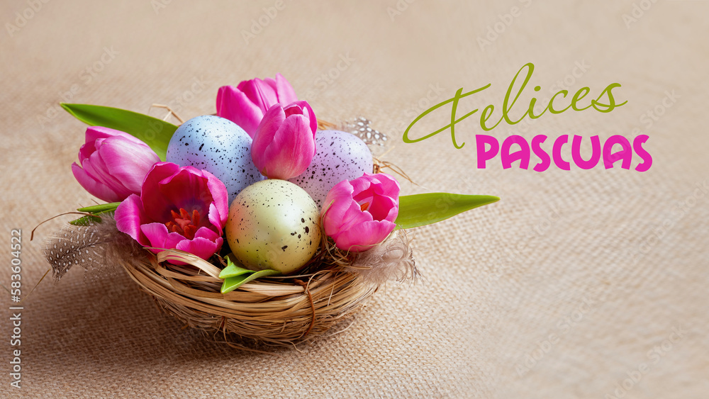 Happy easter! Nest with multi-colored eggs and pink tulips on a canvas background.