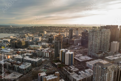 Cityscape of Seattle surrounded by the sea in the evening