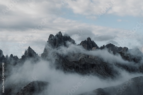 Rocky mountains covered with clouds