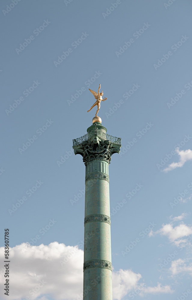 Vertical shot of the Genie of Liberty monument located in Bastille Paris, France