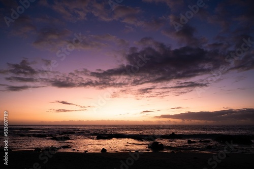 Scenic view of a beautiful sunset visible on the horizon of a beach