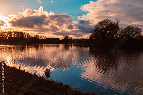 Autumn or indian summer sunset with reflections at Mount Bogenberg, Bogen, Danube, Bavaria, Germany photo