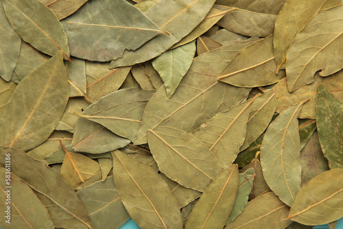 Aromatic dry bay leaves background. Macro photo