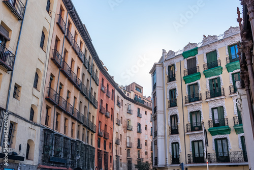 Facades of buildings in the center of Madid, typical houses with their balconies and barred windows. © josemiguelsangar