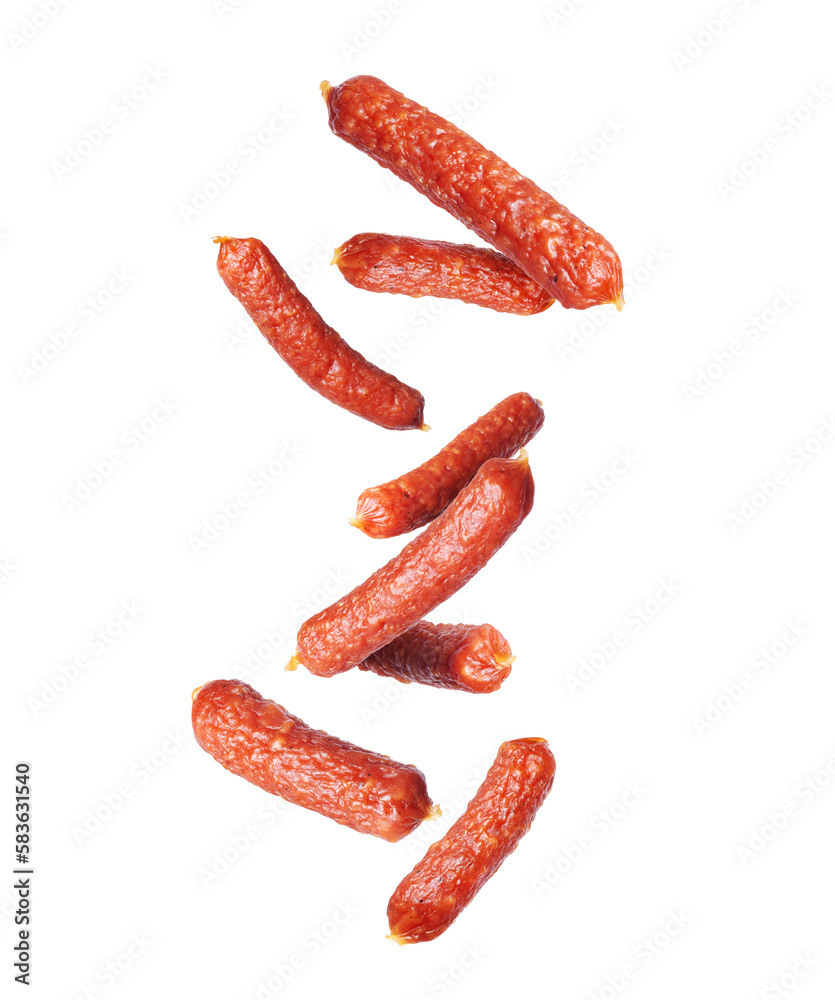 Smoked sausages in the air isolated on white background Smoked sausages in the air isolated on white background