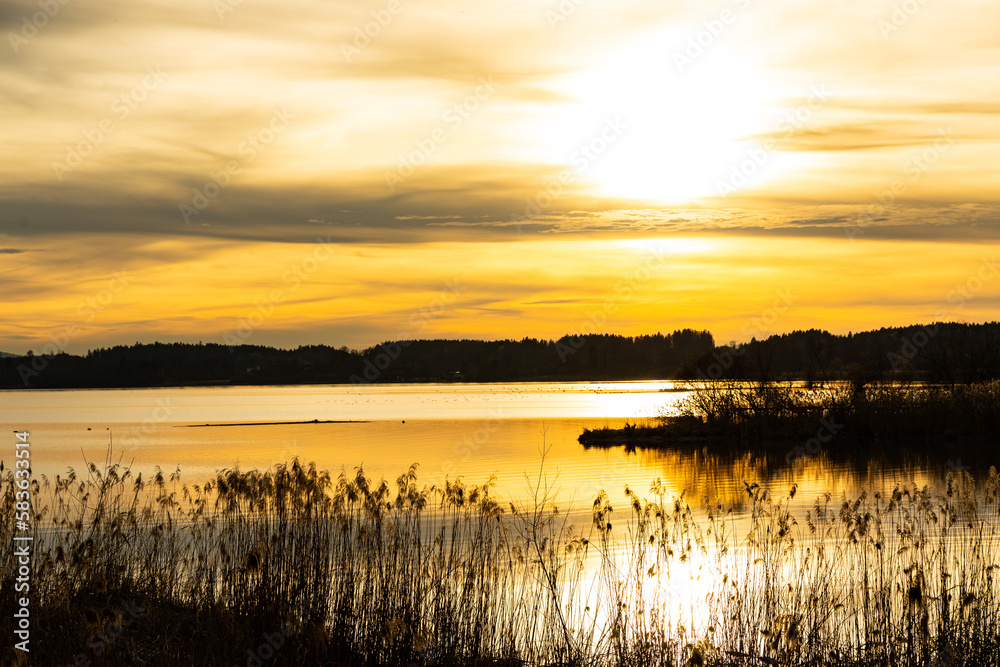 Fototapeta premium view over Chiemsee lake in sunset