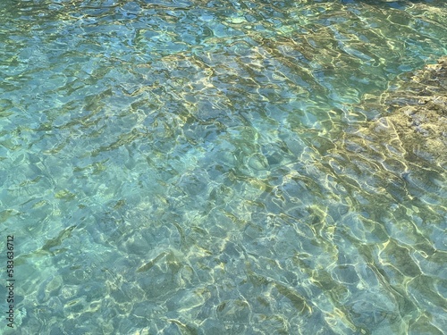 Turquoise sea water clear surface.