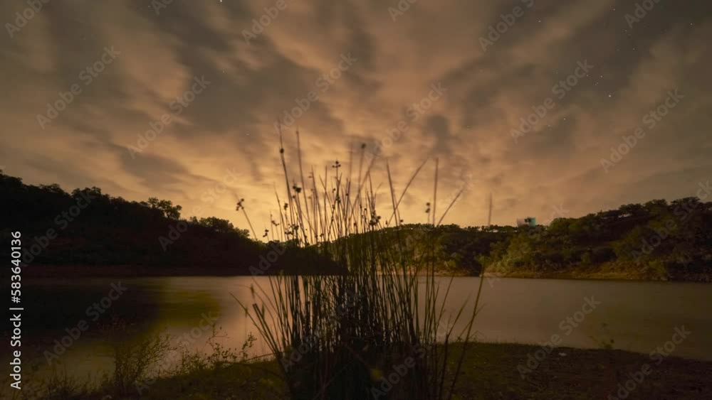 Clouds and stars in the lake of spain Clouds and stars in the lake of spain