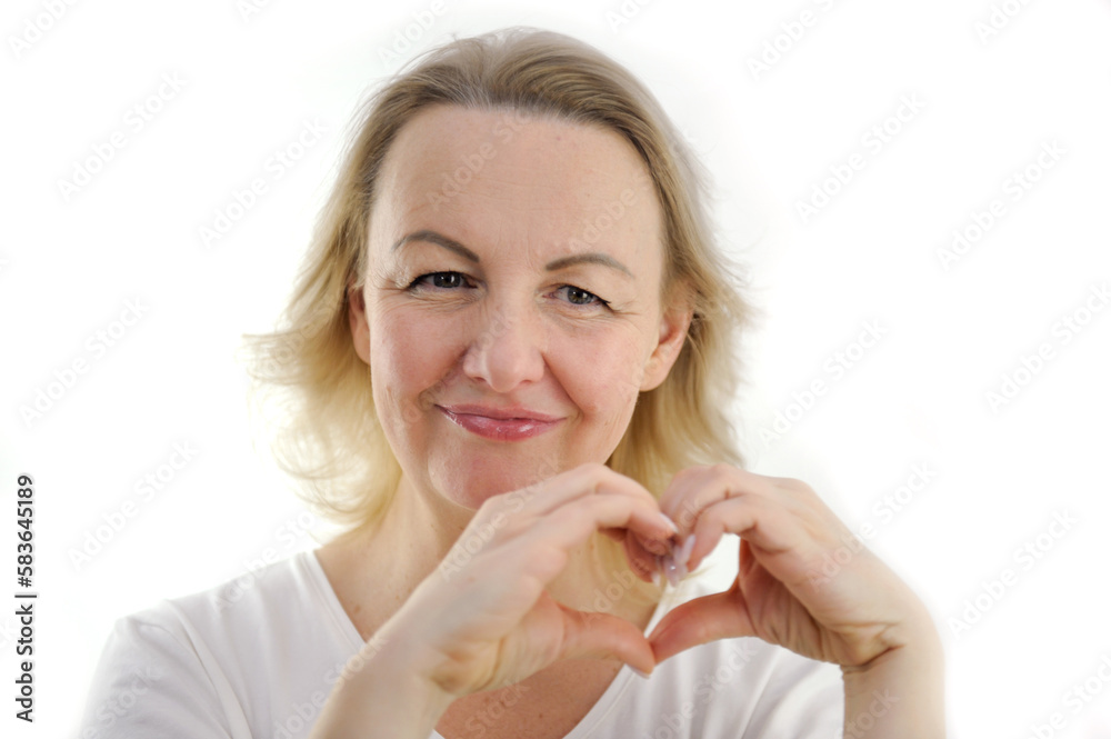 Happy millennial girl hold hands at heart chest feel thankful pray to God at workplace, calm peaceful young woman believer grateful for luck or fate, faith, superstition, gratitude Happy millennial girl hold hands at heart chest feel thankful pray to God at workplace, calm peaceful young woman believer grateful for luck or fate, faith, superstition, gratitude